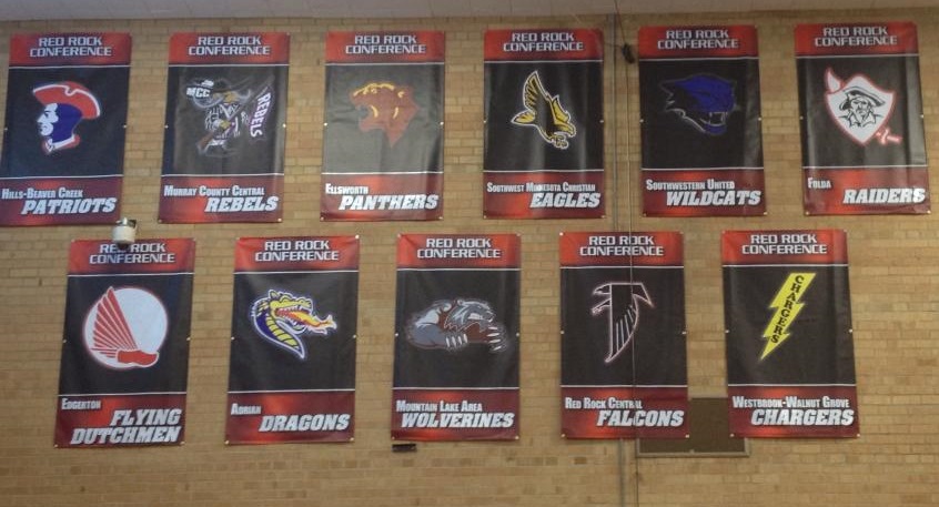 RECENTLY THE MOUNTAIN Lake Area Wolverine Boosters added colorful Southern Confederacy Conference banners to the south wall of the Mountain Lake Public School auditorium, above the bleachers. The boosters sport the school name, sports name and sports mascot for the 11 teams in the conference.