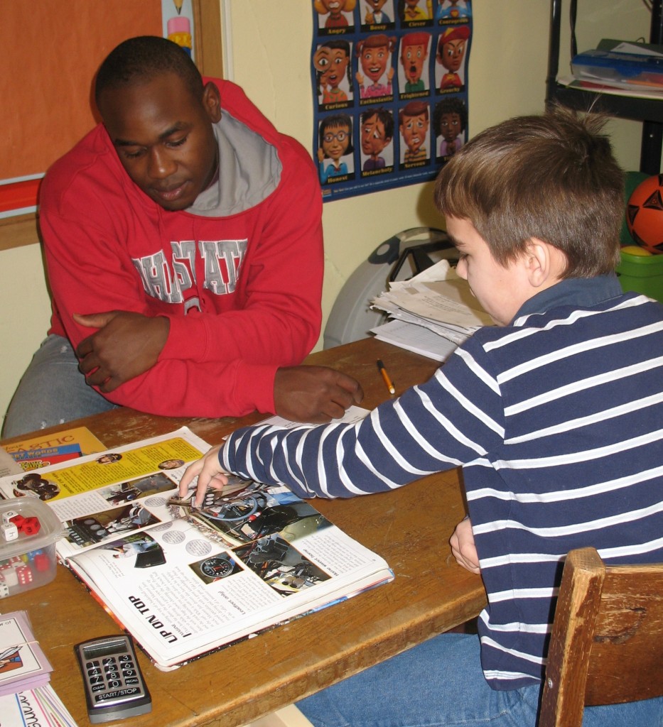 MENTORING CAN ALSO mean just listening - and that is just what senior Demar Rodney is doing in Jenn Fast's third-grade classroom at Mountain Lake Public Elementary.