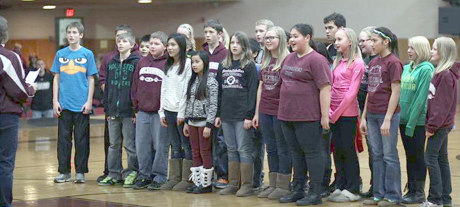 THE MOUNTAIN LAKE Public Elementary School sixth-graders sang the "National Anthem" at "Elementary Night," directed by sixth-grade teacher, Annette Kunkel. (Photo courtesy of Meridee Paulson)