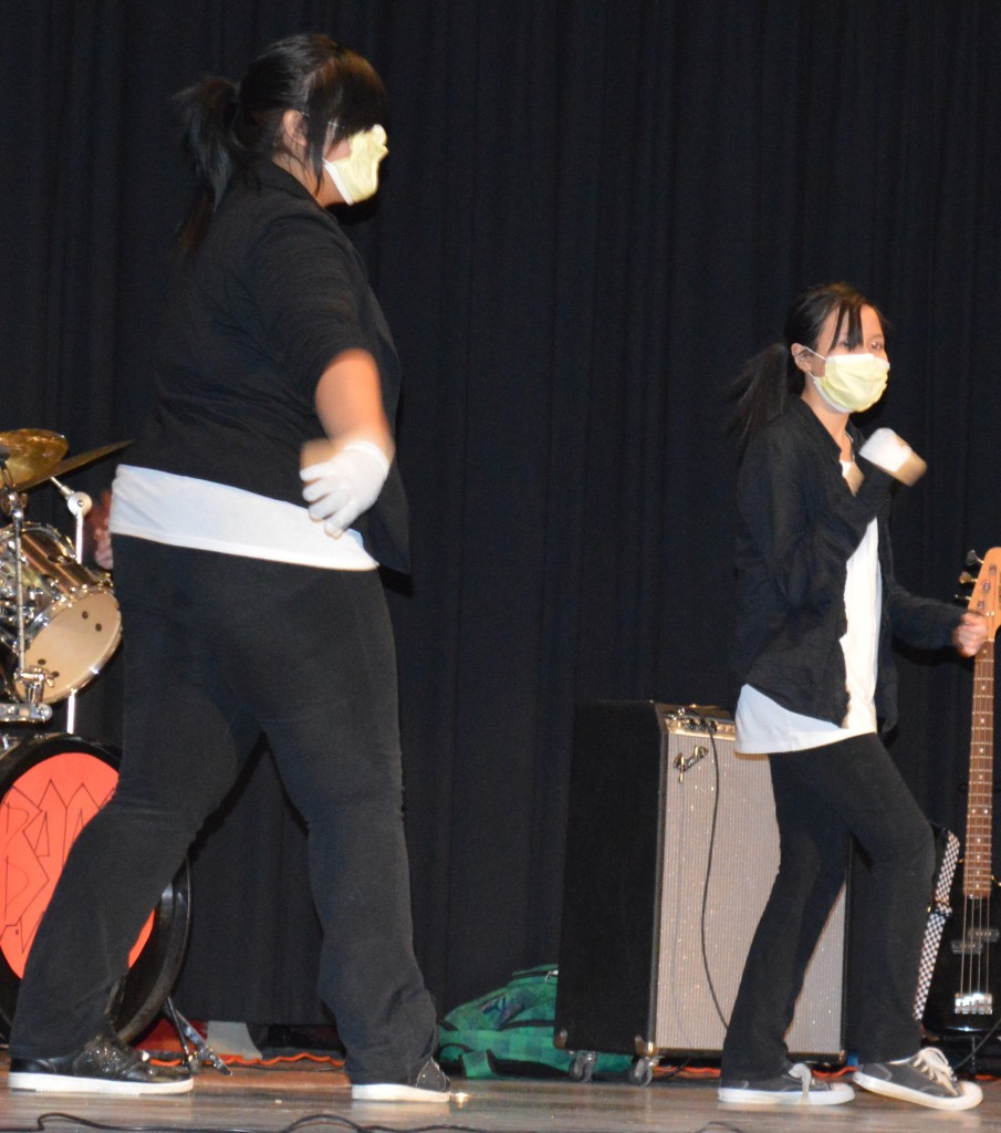 KRISANA, LEFT, AND Kaliana Xayaphonesongkham declare , "You Rock My World," with their dance.