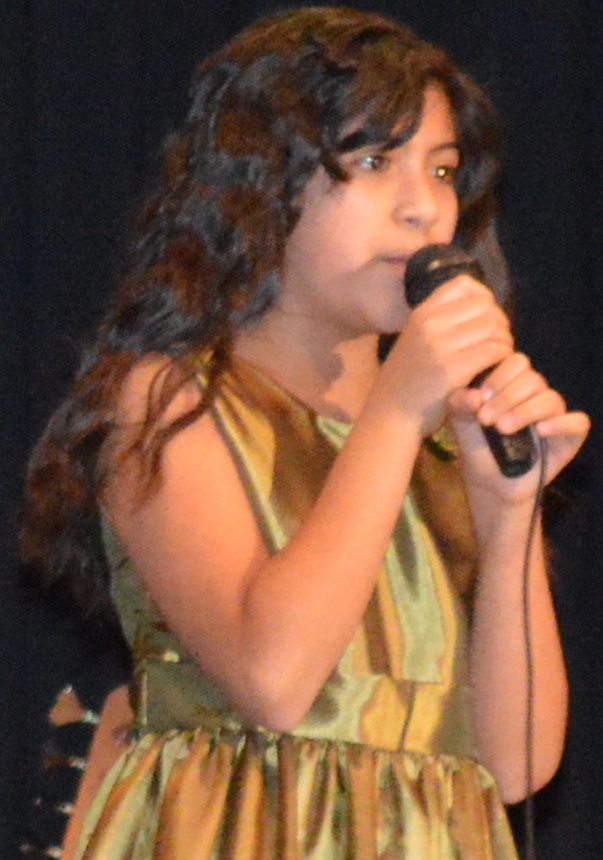 FOURTH-GRADE STUDENT Victoria Naverrete won the 2014 edition of "Battle of the Bands" with her vocal solo, "Rolling in the Deep."