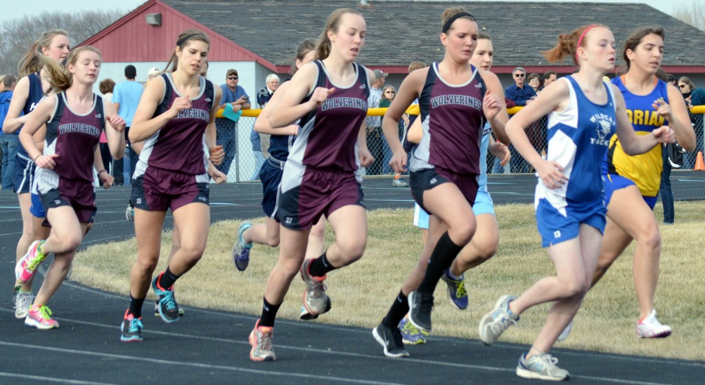 RUNNING THE 1600 meter run. From left, Rebekah Klassen, Jordan Syverson, Liana Blomgren and Brooke Fast. Blomgren finished fifth with a time of 6:13.65