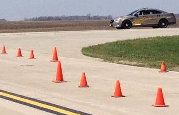 A MEMBER OF the Cottonwood County Sheriff's Office preps to enter the drill area.