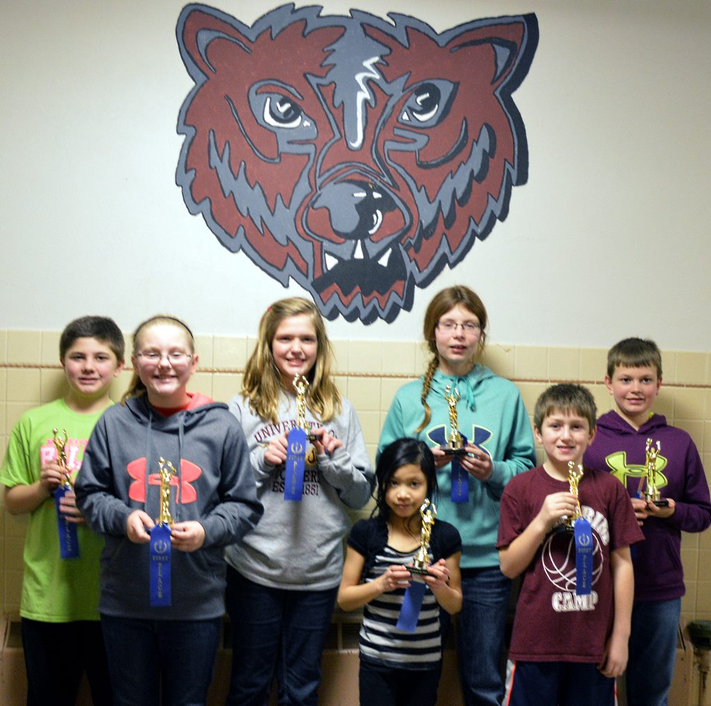 GROUP PHOTO OF the first-place winners in the Free Throw Contest. From left, Sixth Grade Boys Champ Ethan Nickel (18/30), 4th Grade Girls Champ Brooke Naas (23/50), Sixth Grade Girls Champ Annelise Regier (15/30), Third Grade Girls Winner Adaliyah Srixonghou, MLC Girls Champion Elizabeth Linscheid (10/30), Third Grade Boys Winner Joey Faber and MLC Boys Champ Ian Penner (15/30). Not ifth Grade Girls Champ Chloe Anacker (11/30), Fifth Grade Boys Champ Tanner Koetzle (16/30) and Fourth Grade Boys Champ Alex Blom (32/50). Not pictured, 