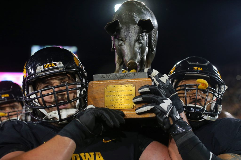 THE IOWA HAWKEYES brought Floyd of Rosedale - a bronze trophy in the shape of a pig introduced into the Iowa/University of Minnesota Gophers football rivalry in 1935 - back to Iowa City following their victory over the Gophers on November 15, 2015. (The Daily Iowan/Margaret Kispert) 