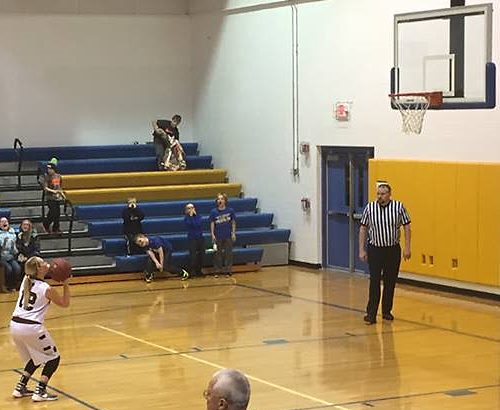 Two free throws at the end of the first half led Signey Stoesz to her 1,000th point of her career. Adrian on top at half , 29-26.