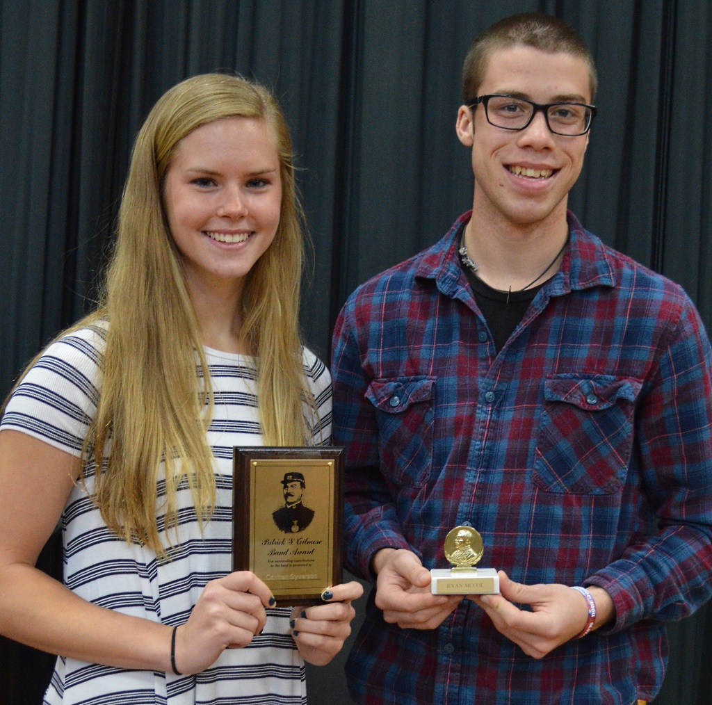 DIRECTOR OF BANDS at MLHS presented a pair of Senior Music Awards at the reception. At left is Levi Jahnke, who received the John Philip Sousa Award and at right is Ben Grev, who was presented the Patrick Gilmore Band Award. The John Philip Sousa Award was created and introduced in 1955 with the approval of Helen Sousa Albert and Priscilla Sousa, daughters of the famous composer and bandmaster. It recognizes superior musicianship, leadership, dependability, loyalty and cooperation. The Patrick S. Gilmore Band Award was introduced in 1994 in honor of the legendary bandmaster and impresario, Patrick Gilmore. Gilmore and his band joined General Burnside’s expedition to North Carolina in the Civil War. Gilmore also played for every president of his day - including Abraham Lincoln. This award honors outstanding high school band students and their achievements, leadership and commitment to the band.