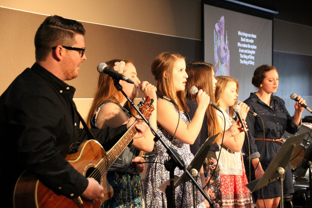 MLC spring 1 Aaron Petersen, with Worship Team Katelyn Fast, Melissa Lohrenz, Danica Dick, Zoey Smith, Chloe Klassen