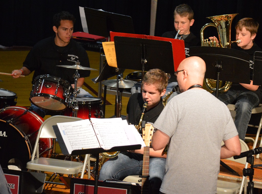 THE JUNIOR JAZZ Wolves shared two selections, "A Darker Shade of Blues," and "Radioactive Jellybeans," both by Dean Sorenson. At front, Daniel Gardiner, left, and MLPS Director of Bands Kurt Jahnke, right, riff on the saxophone and at back, from left, percussionist Joel Salgado on the drum set, Sebastian Rehnelt on trumpet and on baritone, Noah Rempel.