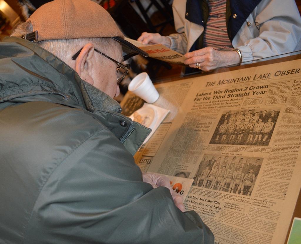 ONE OF THE many Mountain Lake memorabilia items on display in every nook-and-cranny and wall of the inn is this The Mountain Lake Observer from February 1948. Buzz Hotzler is deep in concentration reading about that year's Mountain Lake High School Lakers boys basketball team - and their third straight Region 2 title.