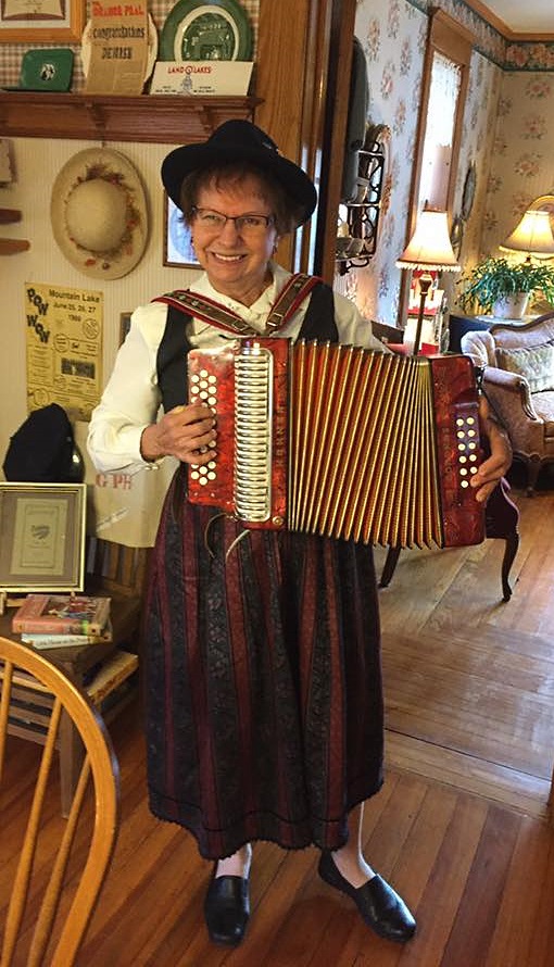 NORMA KURTZWEG OF St. James was on hand to provide a variety of music for Red Brick Inn visitors - from Christmas selections to waltzes - on her button accordion, as well as celebrate her German heritage.