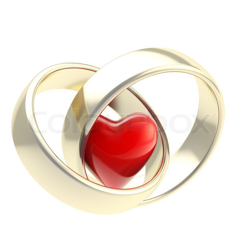 Heart inside golden wedding rings
