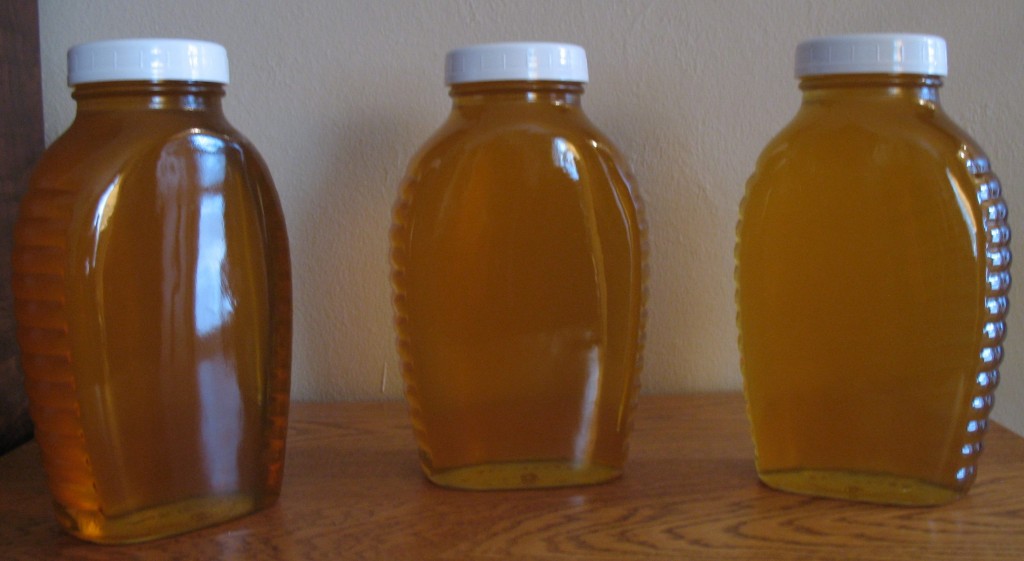 JARS OF HONEY made and donated by Harvey and Esther Buller of Mountain Lake - and their bees.
