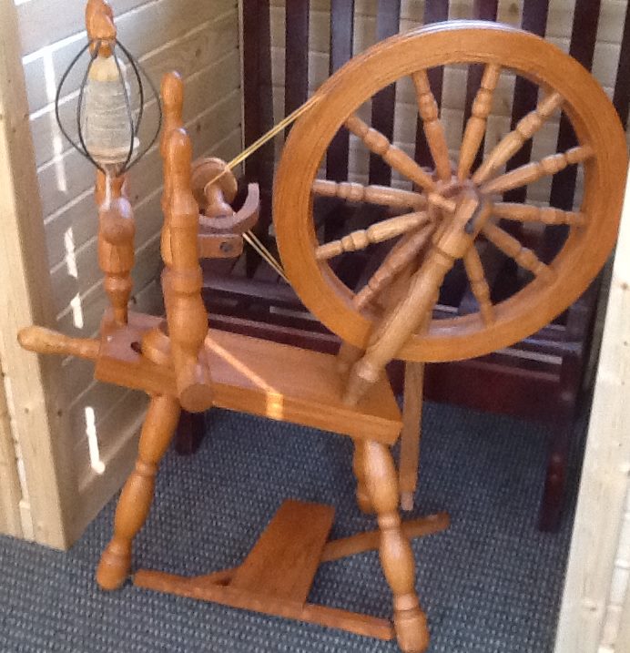 ONE OF TWO spinning wheels on the auction listing.
