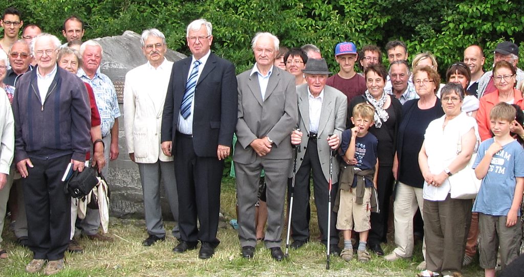 townsfolk at memorial